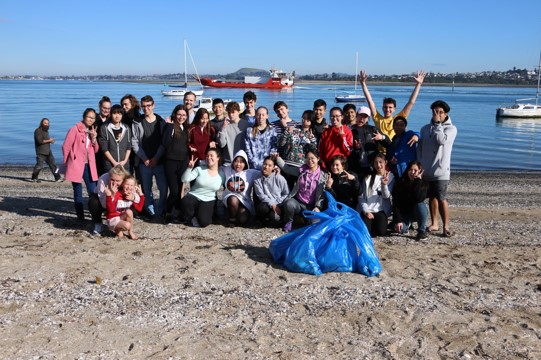 Jefferson and others doing a beach clean up
