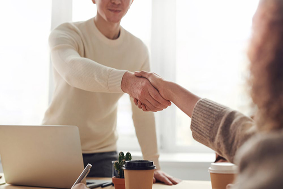 Shaking hands at job interview