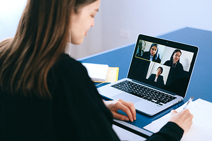 Woman at online screen meeting